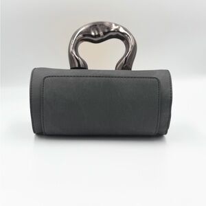 Elegant Matte Black Handbag with Unique Handle